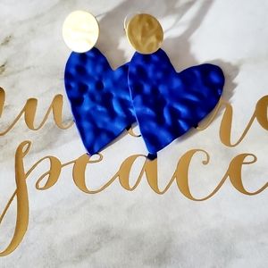 Blue coated metal heart shaped earrings